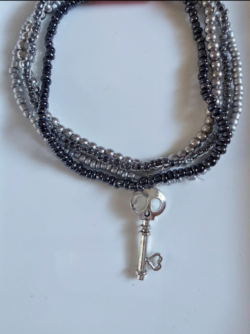 Silver and Gunmetal Beaded Skeleton Key Charm Bracelet